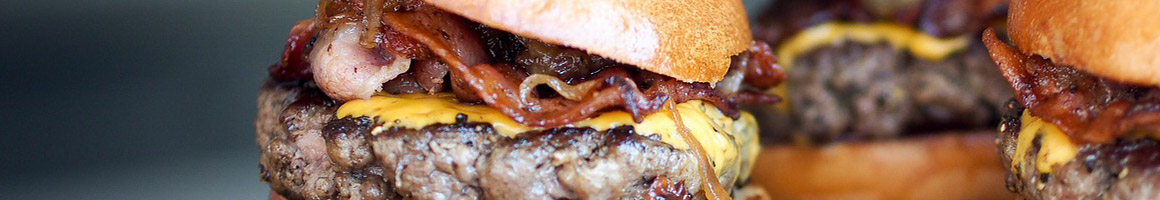 Eating Burger at Super Chili Burgers restaurant in Chino, CA.